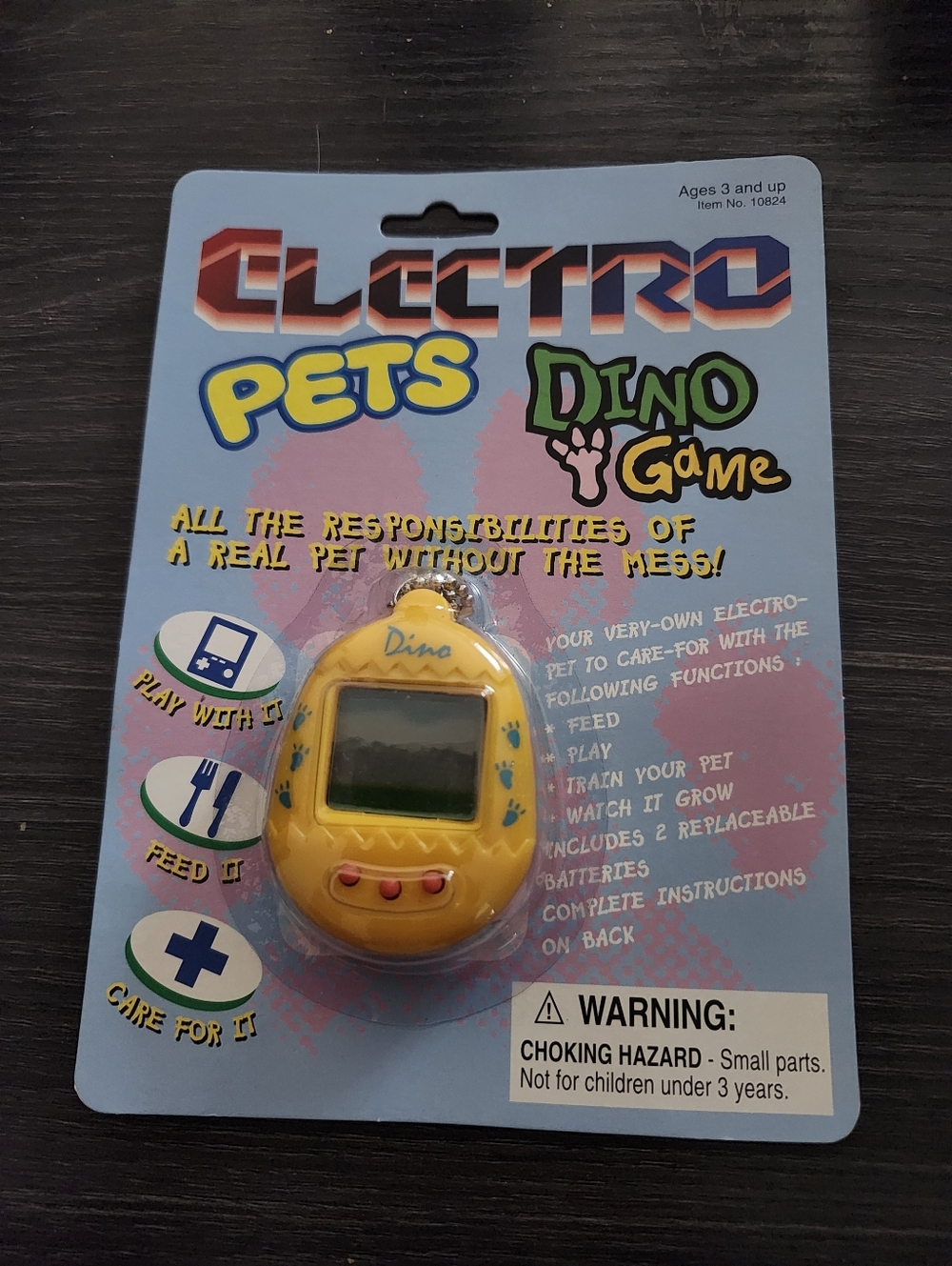 VINTAGE ELECTRO PETS DINO GAME YELLOW TAMAGOTCHI LIKE KNOCK OFF VIRTUAL PET TOY